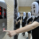 Illustration for article titled Chinese Employees Relieve Stress with Studio Ghibli Masks